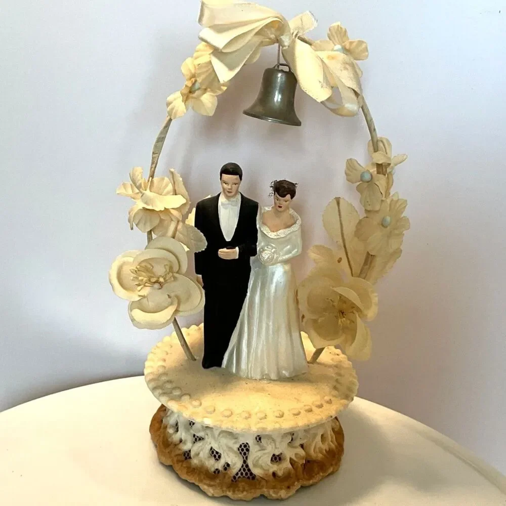 Stunning vintage wedding cake topper; silk bow, chalkware figures dated 1958